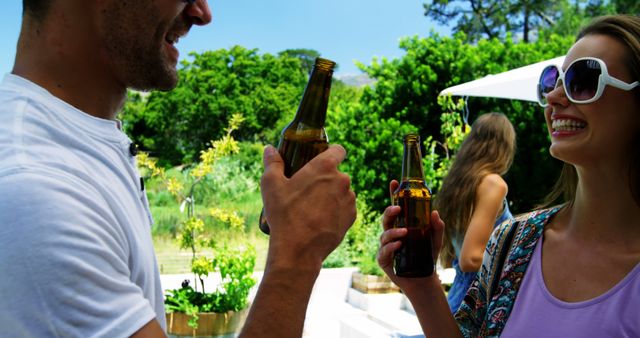 Friends Conversing and Enjoying Drinks in Outdoor Setting - Download Free Stock Images Pikwizard.com