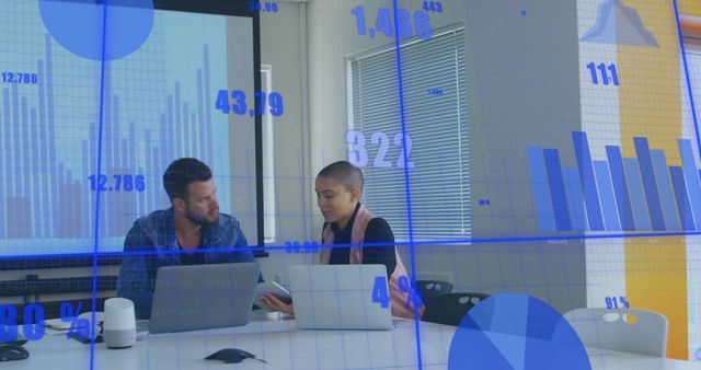 Business Colleagues Analyzing Data with Projection Charts - Download Free Stock Images Pikwizard.com