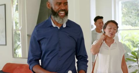 Diverse Group Smiling Leisurely Indoors, Casual Atmosphere