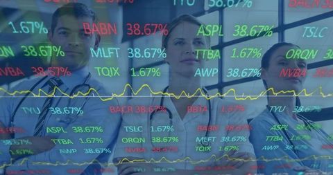 Financial analysts analyzing stock market trends in modern office