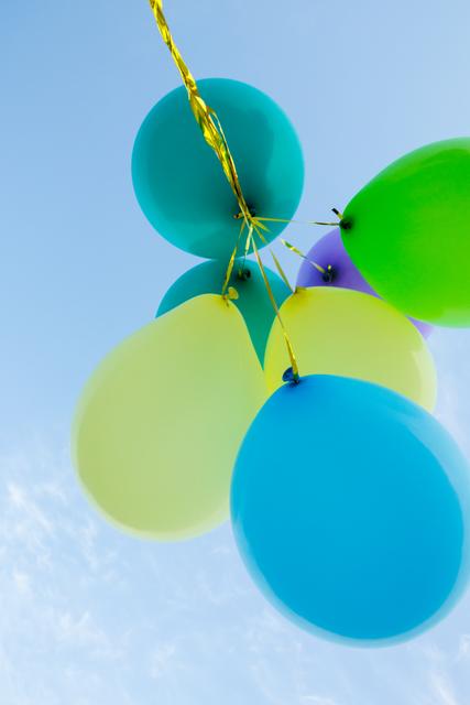 Pastel Balloons Floating Against Blue Sky - Download Free Stock Photos Pikwizard.com