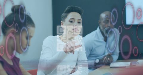 Diverse business team discussing digital technology integration