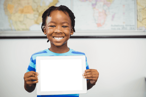 transparent tablet in classroom with smiling child - Download Free Stock Videos Pikwizard.com