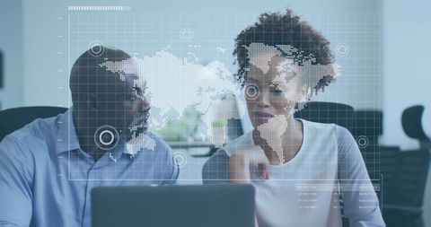 Professionals collaborating over laptop with world map hud and data analytics overlay