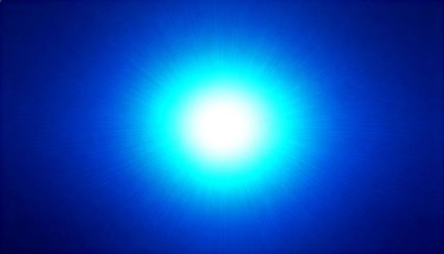 Radiating cyan light burst with radial halo and lens flare abstract blue gradient background