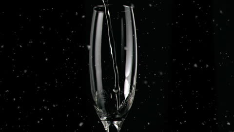 Champagne Glass with Abstract Light Dots on Black Background