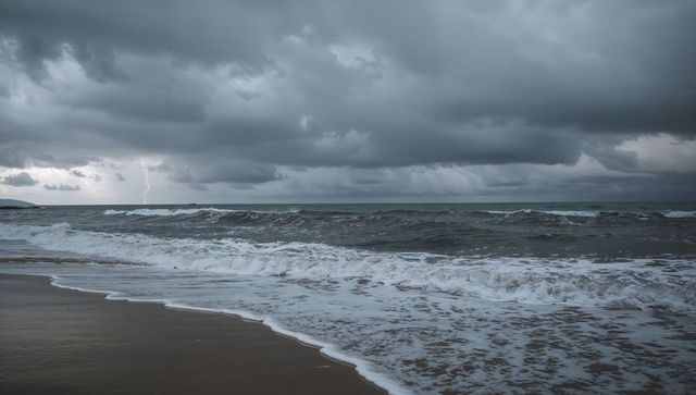 Dramatic lightning over turbulent sea with dark storm clouds