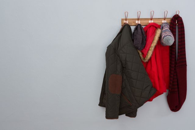 Warm clothing hanging on hook - Download Free Stock Photos Pikwizard.com
