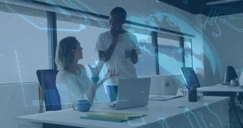 Colleagues Engaging in Creative Office Dialogue with Digital Overlay