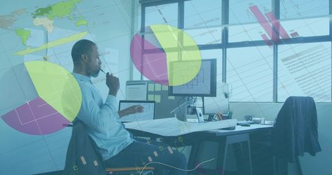 Focused Professional Analyzing Data with Graph Overlays