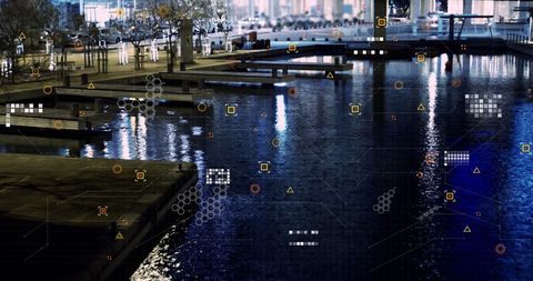 Digital connectivity overlaying urban waterfront at night