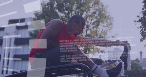 male athlete wearing a red tank top exercises with a prosthetic leg, symbolizing determination and inclusivity. uses wireless earbuds and digital scans convey advancing communication technology. ideal for illustrating themes of sports motivation, technological integration in fitness, and overcoming adversity.