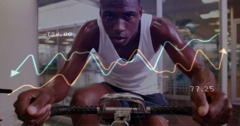 Indoor rower athlete pulling handle with performance data overlays for fitness tech