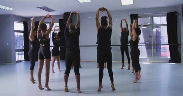 African Dance Class Stretching Together in Studio - Download Free Stock Images Pikwizard.com