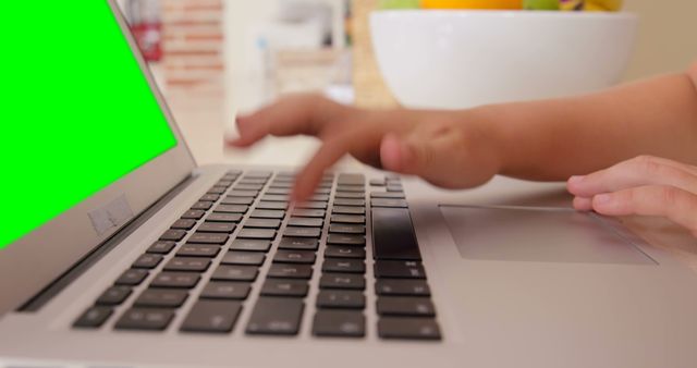 Child Using Laptop with Green Screen, Hand Typing - Download Free Stock Images Pikwizard.com