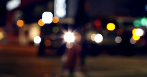 Defocused City Traffic and Nightlife with Illuminated Streetlights - Download Free Stock Images Pikwizard.com
