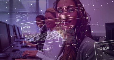 Smiling Businesswoman Working at Computer Workstation with Augmented Reality Data Overlays