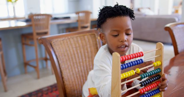 Young Child Learning with Abacus at Home - Download Free Stock Photos Pikwizard.com