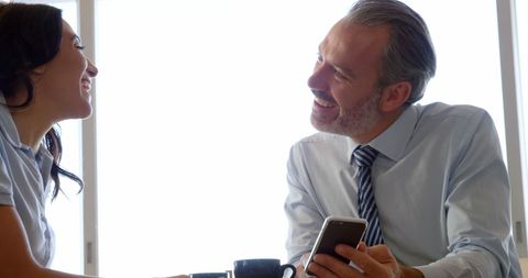Businessman Engaging with Colleague Over Coffee - Download Free Stock Images Pikwizard.com