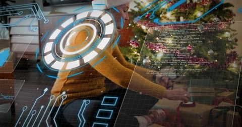 Mature woman wrapping gifts by decorated christmas tree with futuristic hud overlay