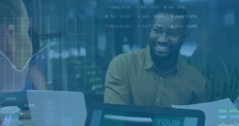 Diverse Team Analyzing Financial Data with Innovative Technology