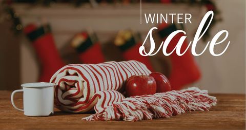 Winter Sale Banner with Warm Beverages and Cozy Blankets