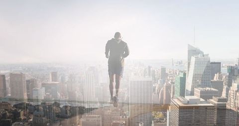 Man Running Above Cityscape: Fitness and Wellbeing