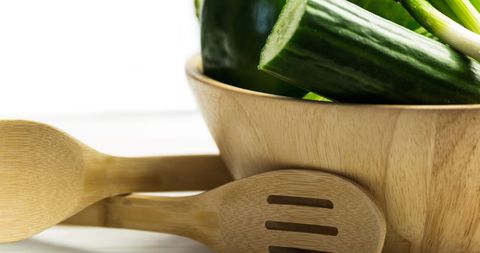 Fresh Cucumbers in Wooden Bowl with Wooden Spoons - Download Free Stock Images Pikwizard.com