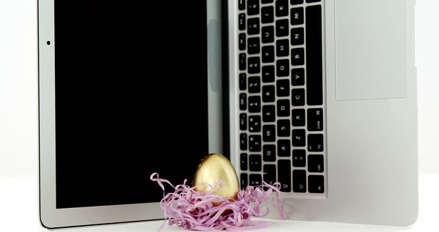 Golden Egg and Laptop Screen Representing Digital Rewards - Download Free Stock Images Pikwizard.com