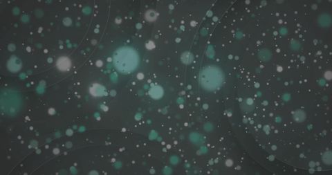 Glowing light spots on dark background creating loop