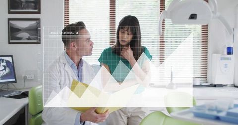 Dentist consulting patient holding dental mold in clinic with virtual diagnostic overlay