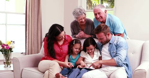 Family Technology Time: Grandparents and Parents with Happy Children