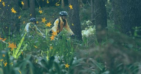 Star-studded forest adventure with cyclists navigating scenic trail