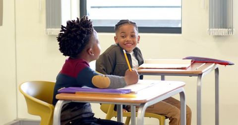 Diverse Classmates Collaborating in Classroom Setting