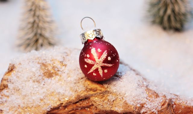 Red Christmas Bauble with Snowflake on Snow-covered Wood - Download Free Stock Photos Pikwizard.com