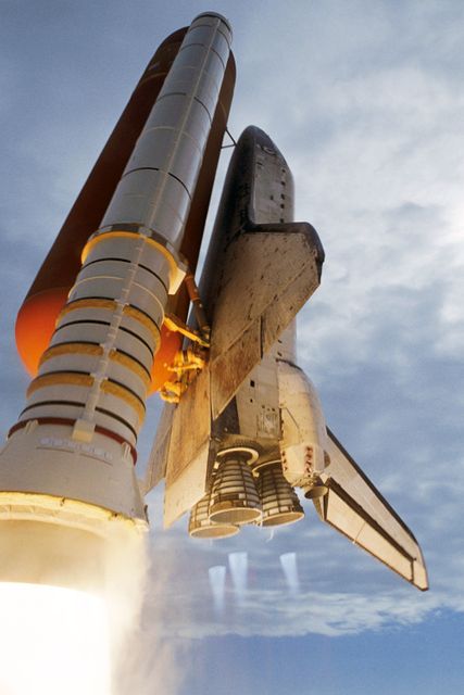 Image shows Space Shuttle Discovery during the launch of the STS-120 mission from Kennedy Space Center on October 23, 2007. This mission aimed to deliver and install the Harmony module to the ISS. Perfect image for showcasing historical space missions, scientific exploration, and aerospace technology advancements.