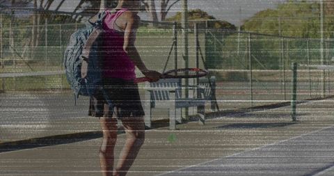 Female Tennis Player Standing on Court with Racket and Backpack