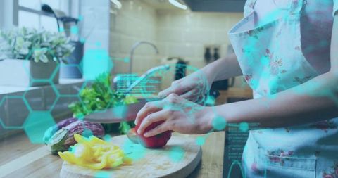 Woman Chopping Vegetables with AR Overlay in Modern Kitchen