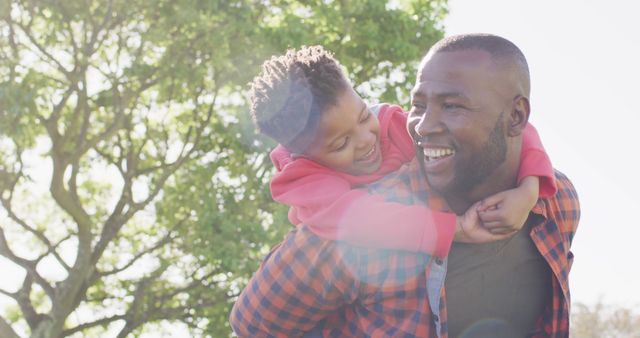 Father Giving Piggyback Ride to Happy Son in Park - Download Free Stock Images Pikwizard.com