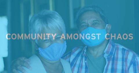 Senior Couple Embracing While Wearing Protective Face Masks