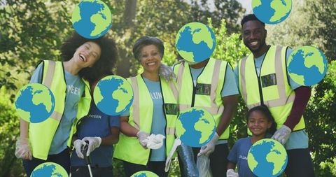 Diverse family volunteers cleaning park for eco conservation
