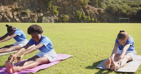 youth outdoor exercise, happy girls stretching, sunny field - Download Free Stock Images Pikwizard.com