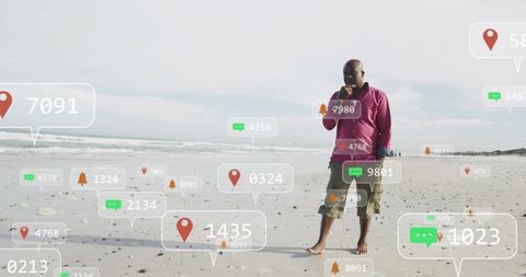 Senior man scanning augmented reality markers on shoreline using smartphone