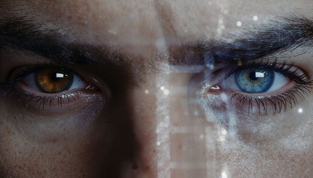 Displaying heterochromia close-up left amber iris and right blue iris with freckles