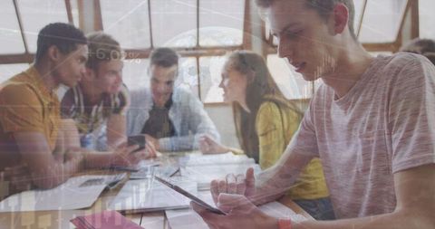 Students Engaging with Technology in Collaborative Study Session