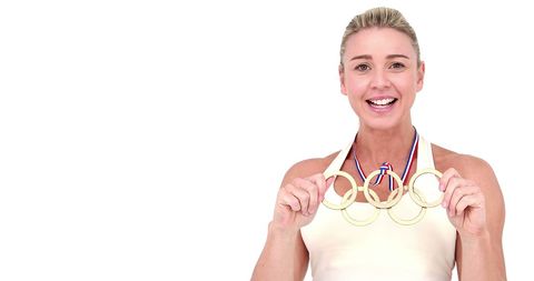 Athlete Holding Gold Medals Celebrating Victory