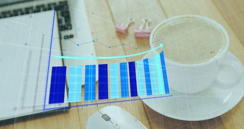 Growth Chart Graph with Laptop and Coffee on Wooden Desk