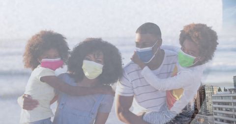 African American Family Enjoying Beach During New Normal