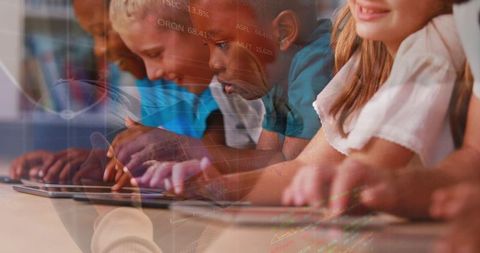 Diverse Students Engaged with Tablets in Technology Learning