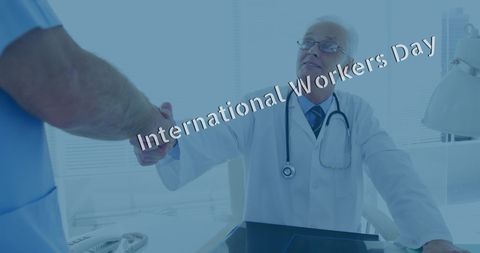 Doctors celebrating international workers' day in clinic